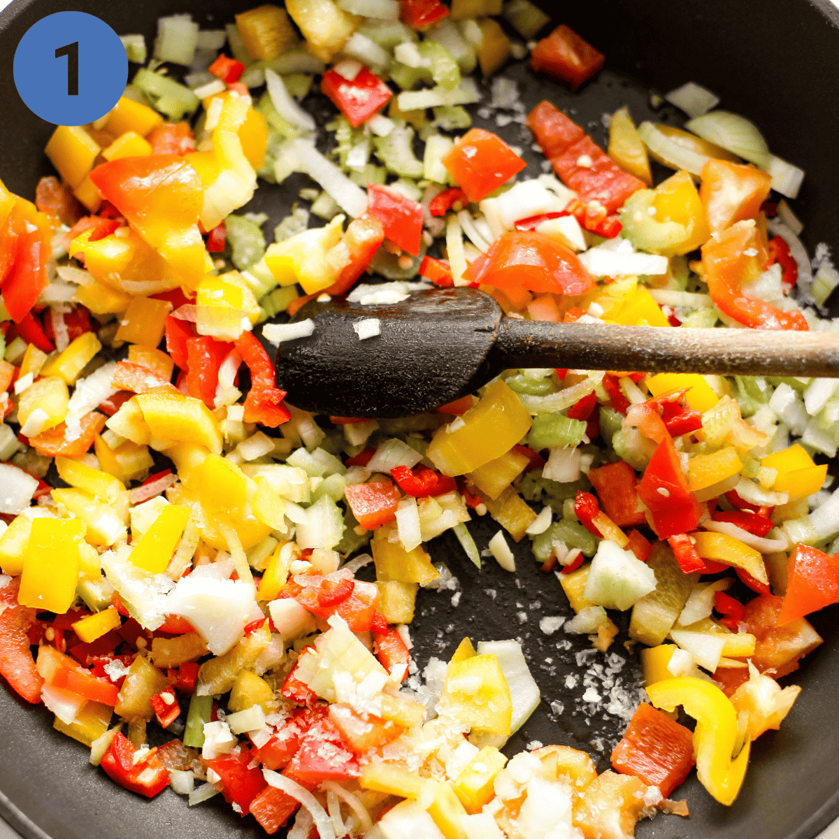 Sauteeing vegetables for jambalaya.