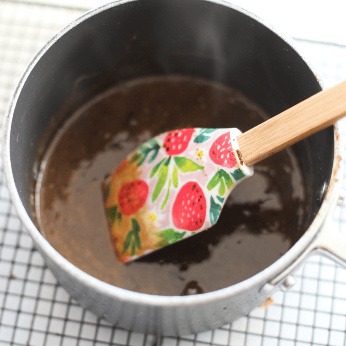 Melting sugar in a pan.