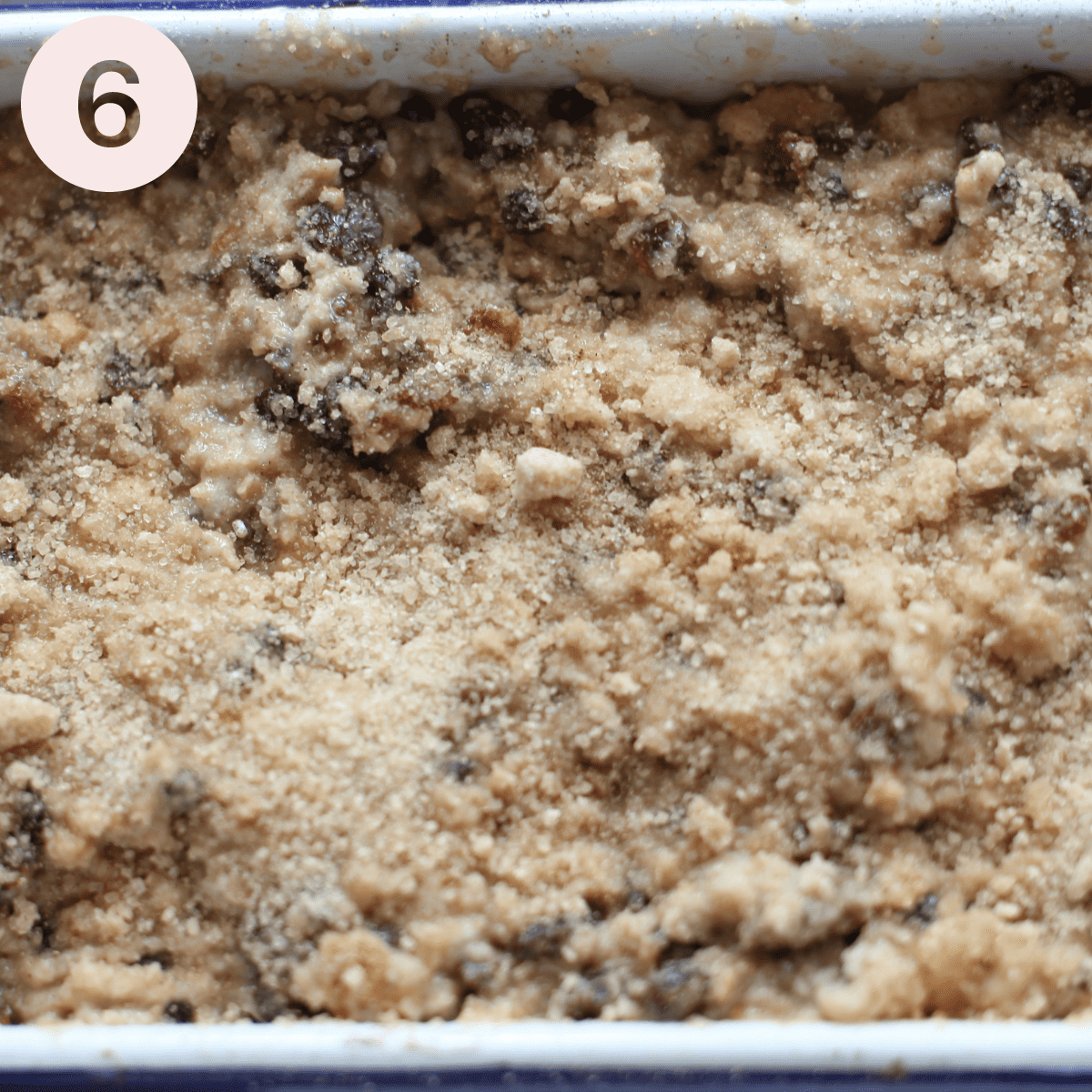 Sprinkling brown sugar on the top of the mixture.