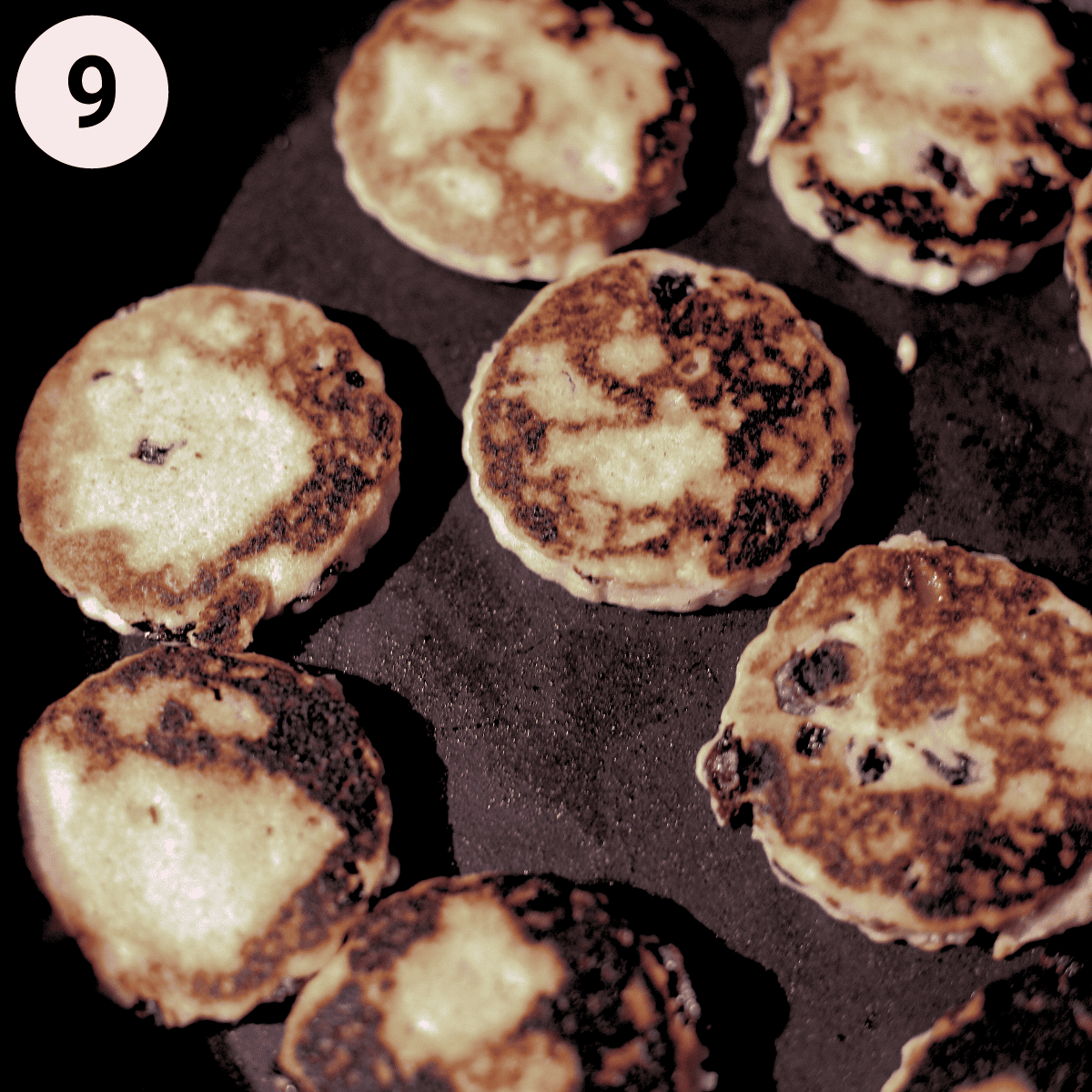 Frying welsh cakes in a pan.