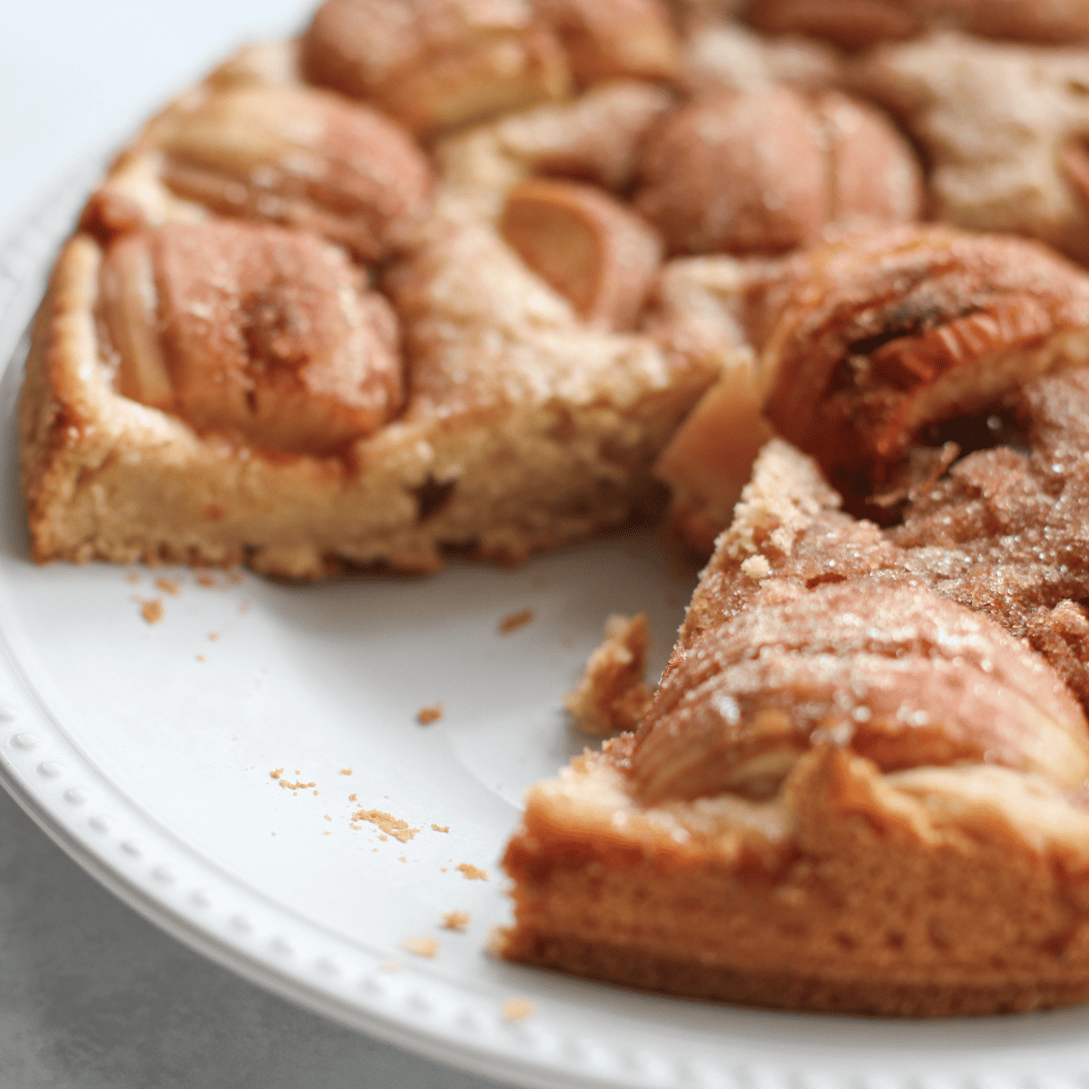 Apple cake with a slice cut out.