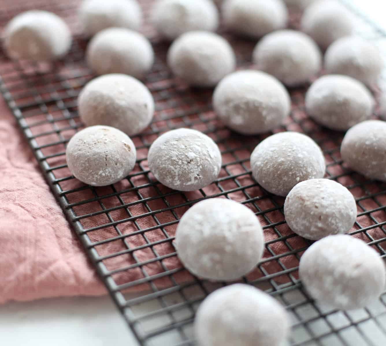 A cooling rack with pfeffernusse.