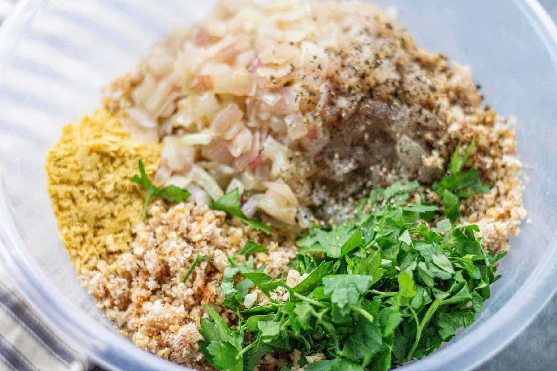 Mixing all of the nutroast ingredients together in a mixing bowl.